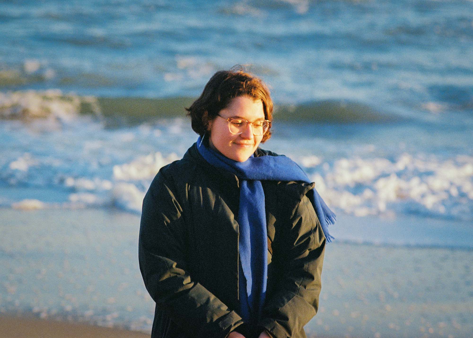 Ana on the beach by the sea.