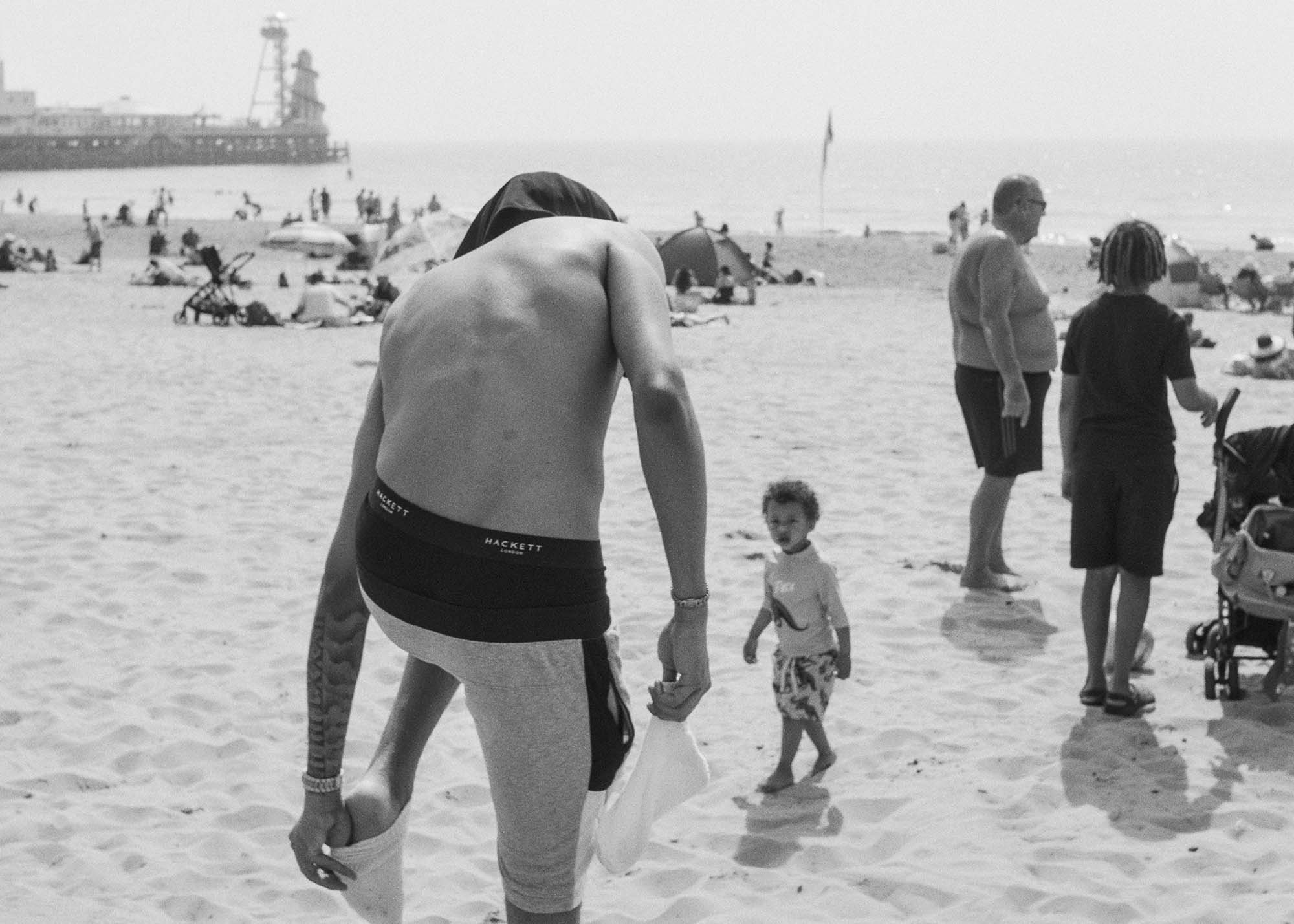 People on Bournemouth beach.